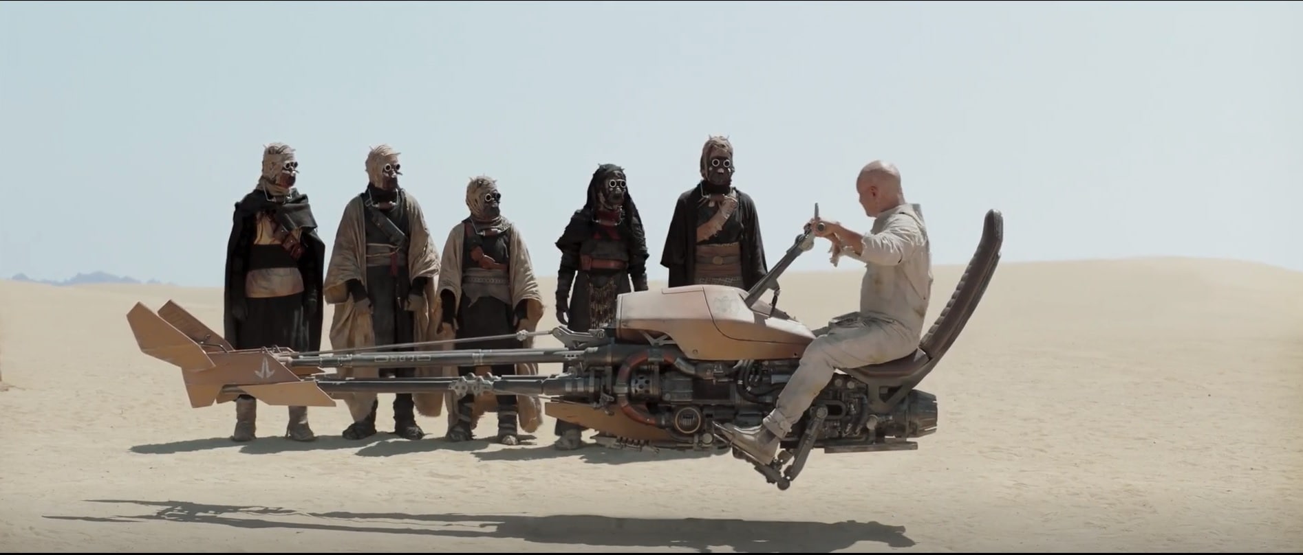 Boba Fett teaches the Tusken Raiders how to ride a speeder