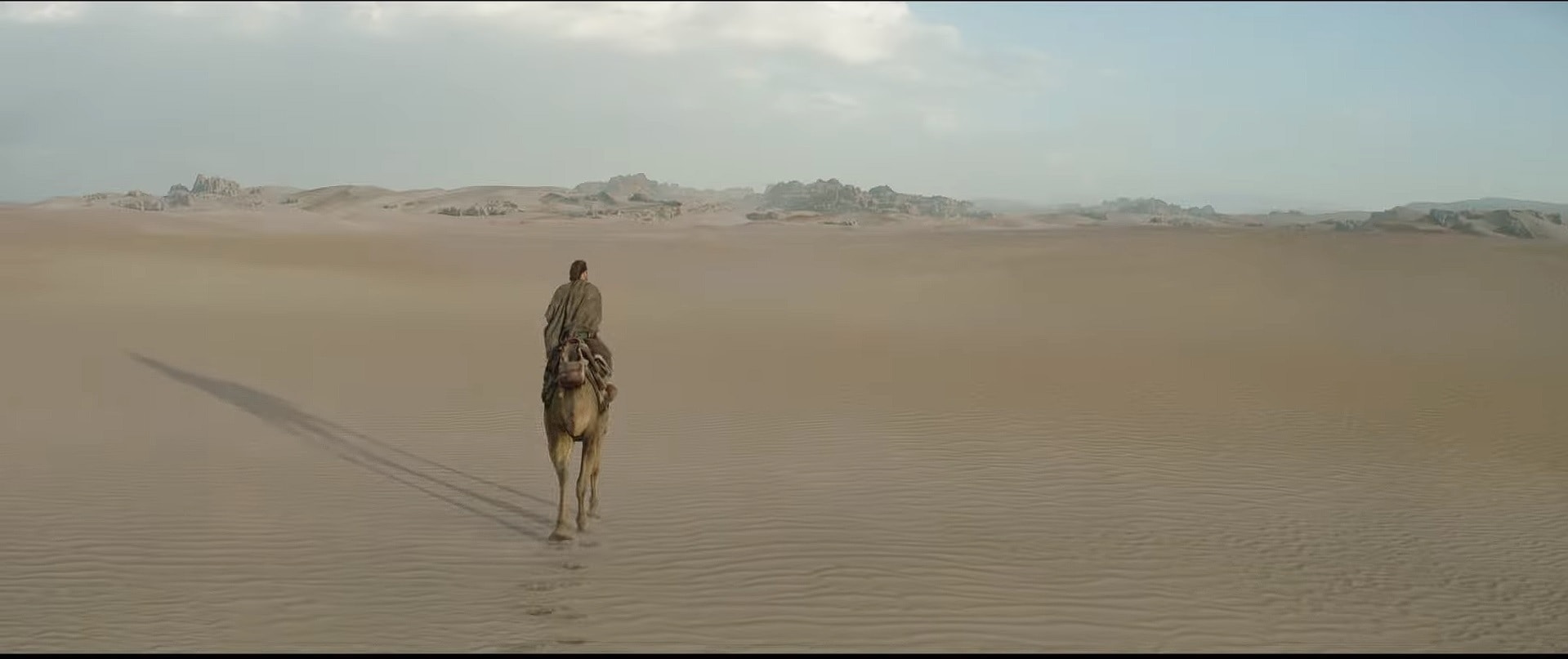 Kenobi riding through the desert