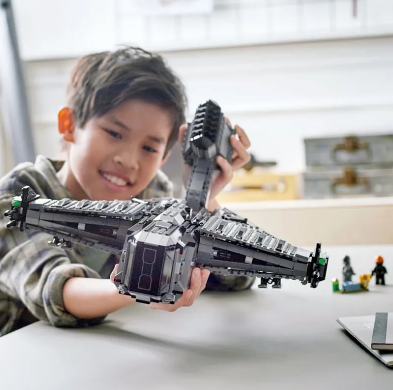 The Justifier LEGO Set - a kid playing with it