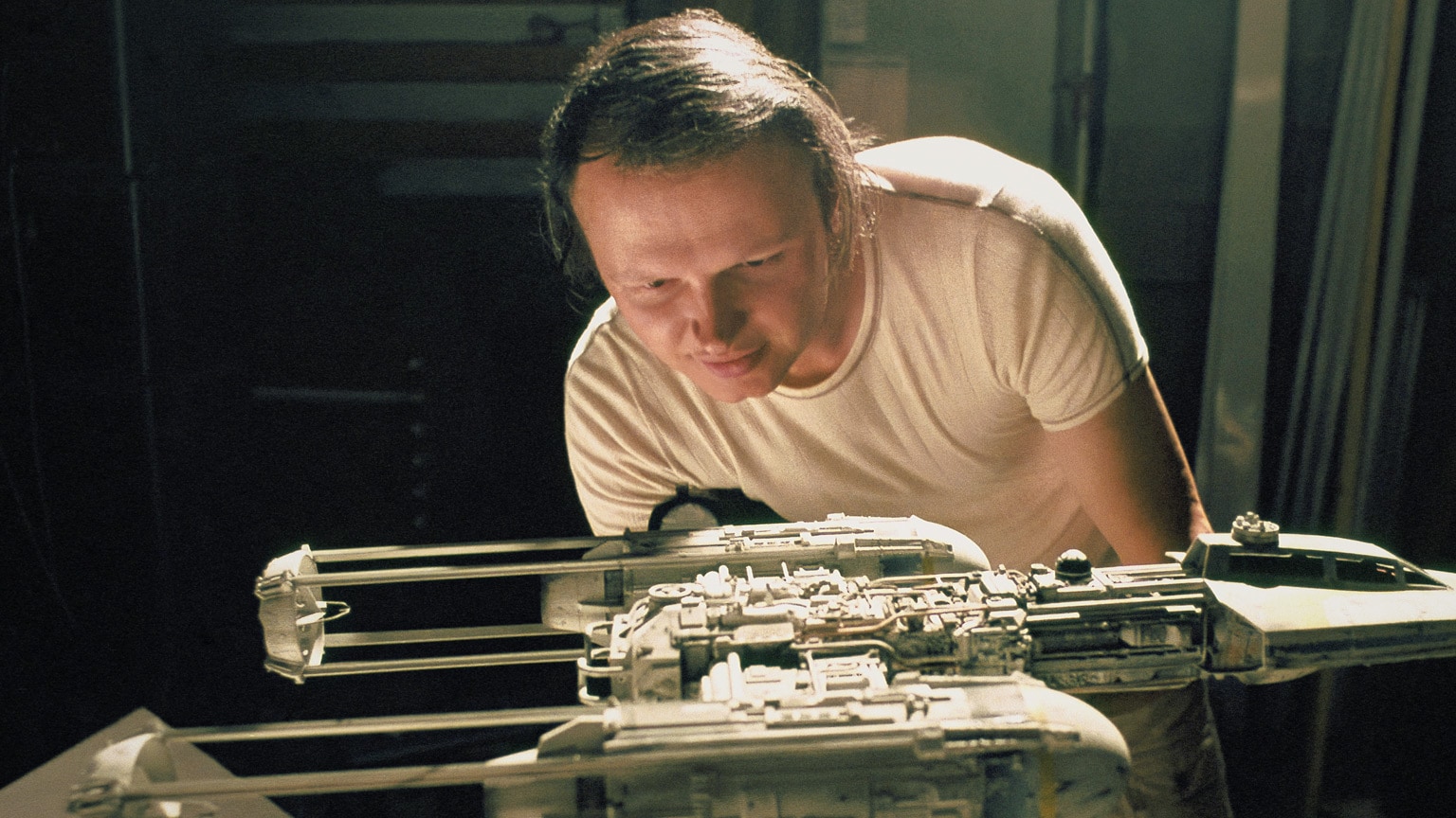 Dennis Muren with a Y-Wing Starfighter model