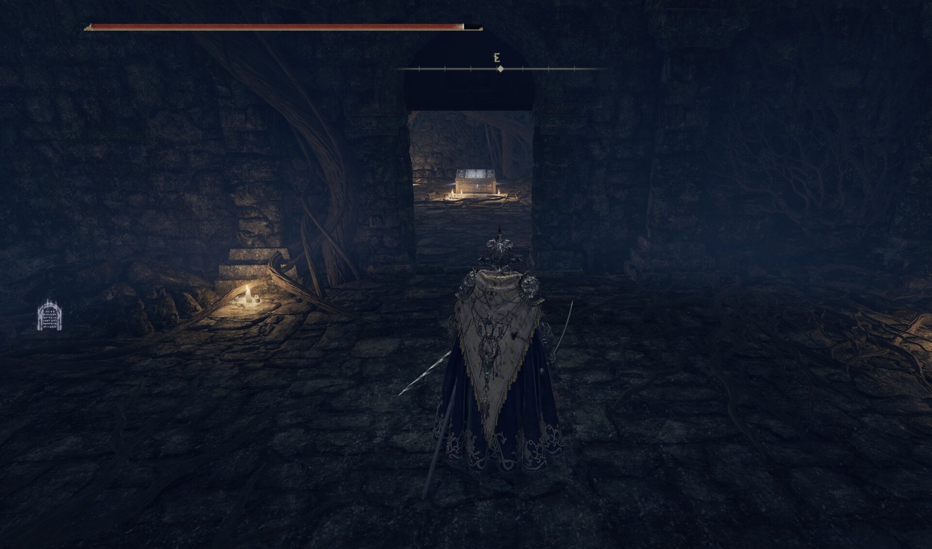 The transporter trap chest at the Dragon-Burnt Ruins at Agheel Lake in Limgrave