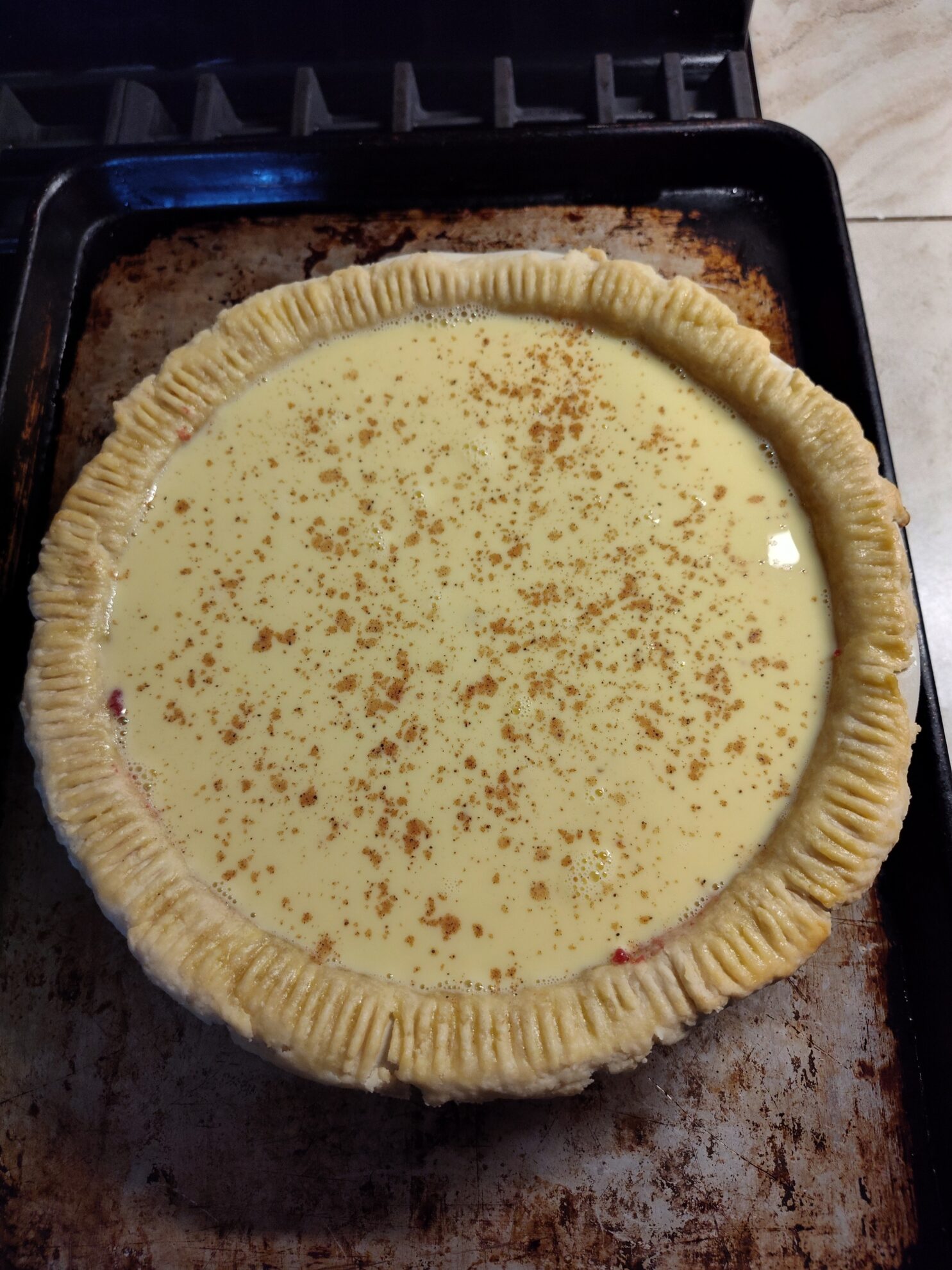 Assembling and Baking the Pie: fill with custard