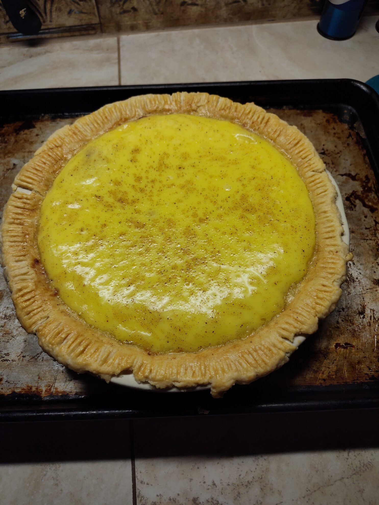 Assembling and Baking the Pie: custard puffed