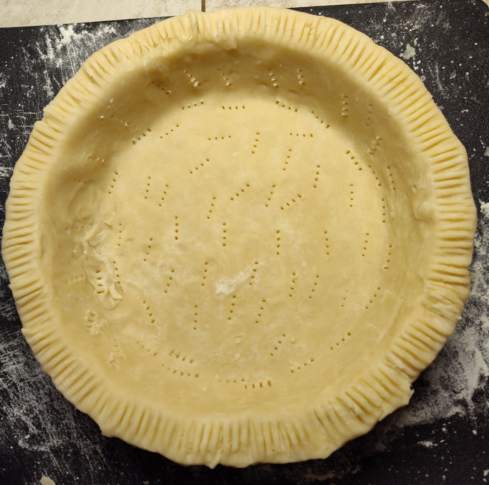 Bestine Threeberry Pie poke holes in the crust