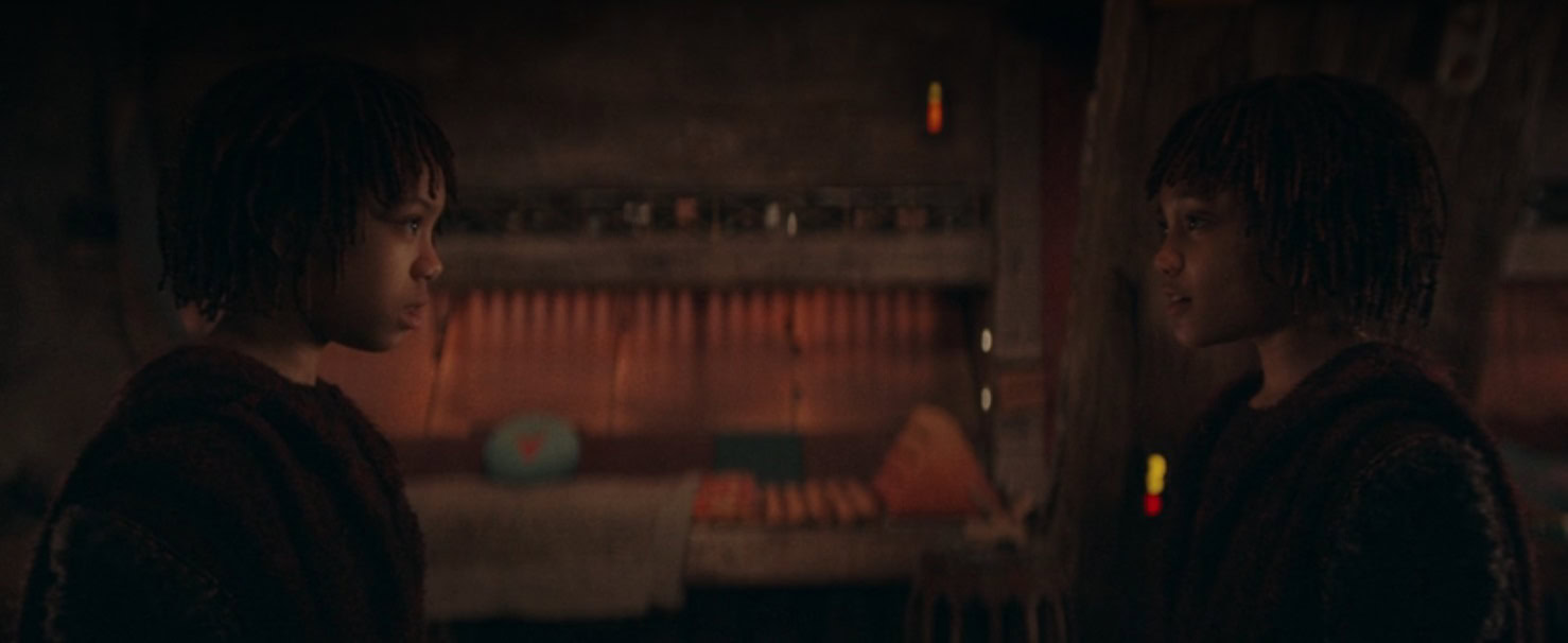 The two twin sisters Mae and Osha staring at each other, scene from The Acolyte premiere