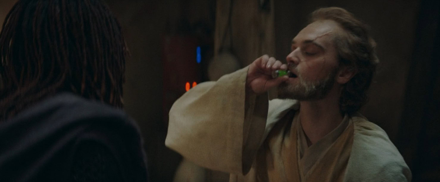 Master Torbin drinking the poison Mae gives him