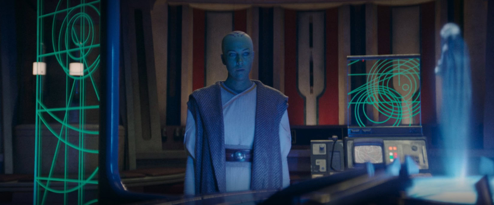 Verna talks to a senator on the holo