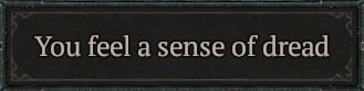Flavor text for the Ring of Misfortune's Unique Dread Debuff, which reads, "You feel a sense of dread."