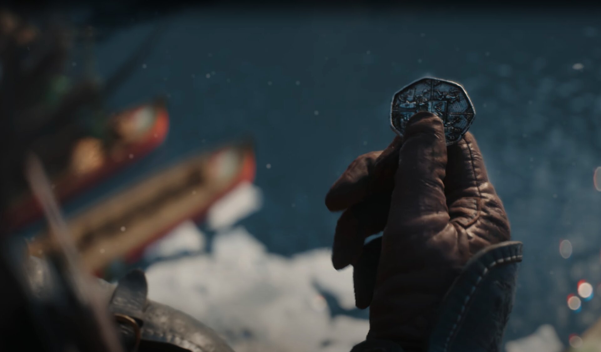 Ciri holds the coin from the smuggler