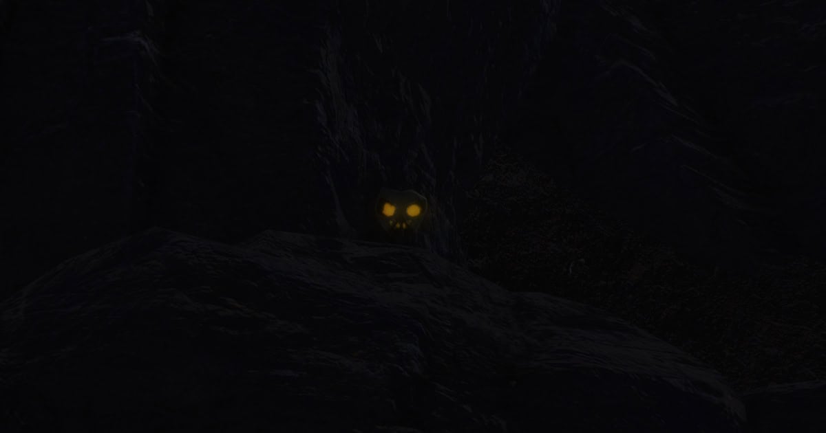 The glowing skull overlooking the rock