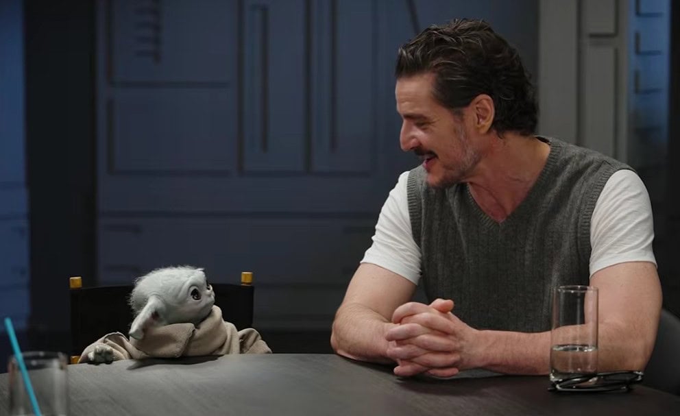 Pedro Pascal is talking to the Grogu puppet on the Podcast